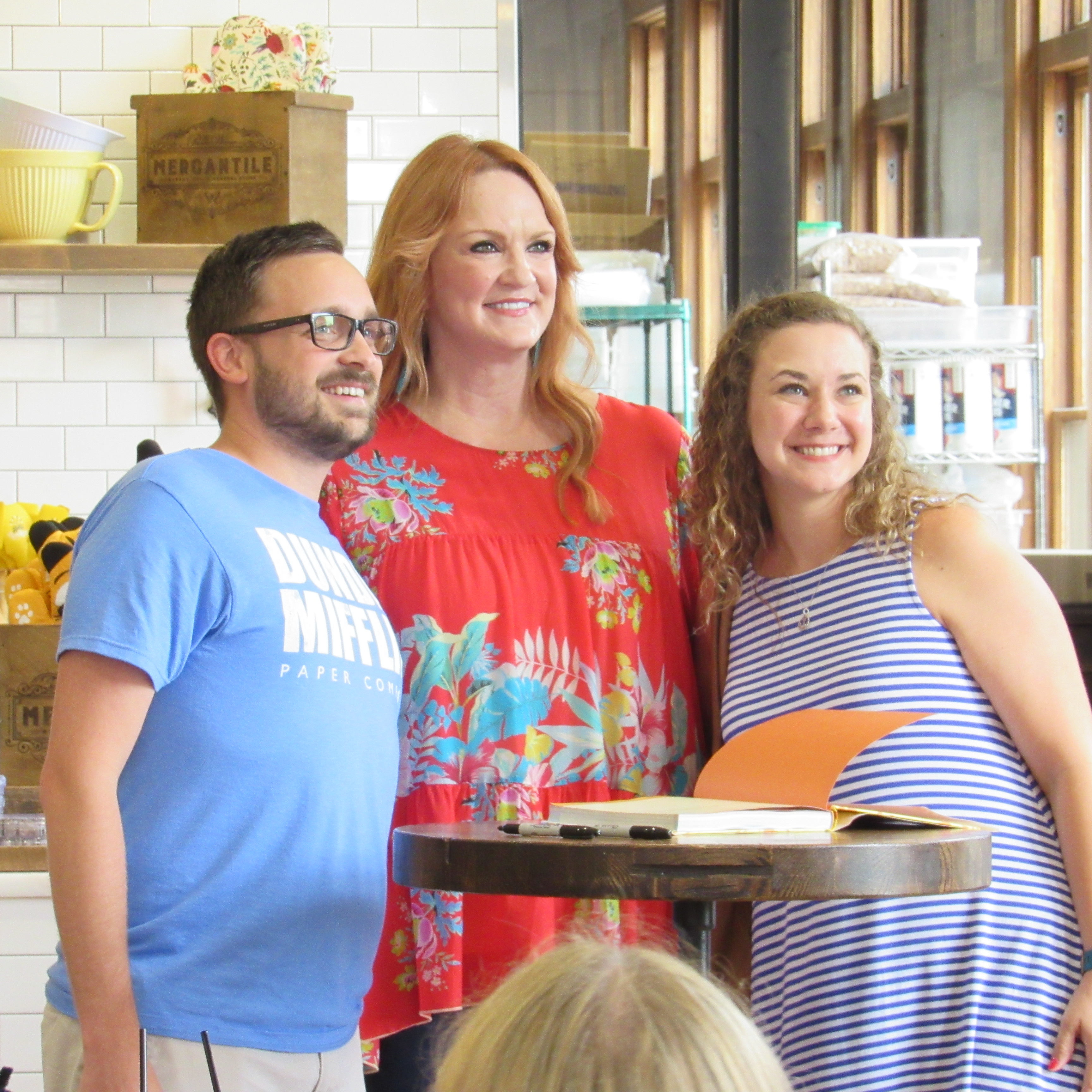 Ree Drummond with man and woman in The Pioneer Woman Mercantile